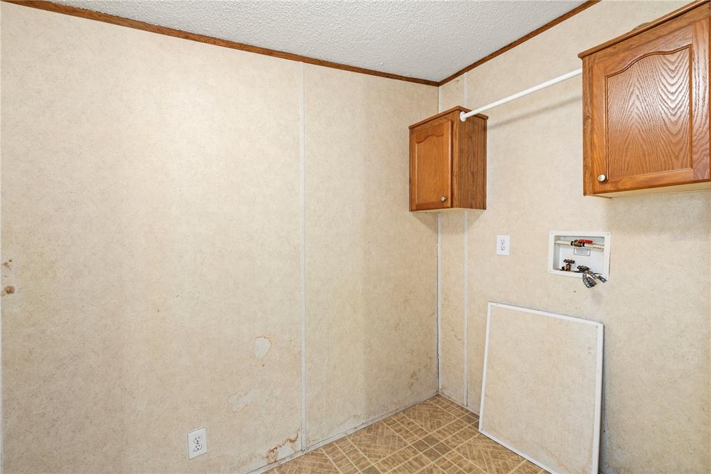 32443 Memory Lane Leesburg, FL 34788 - Photo 29 of 51 a bathroom with a shower and a sink