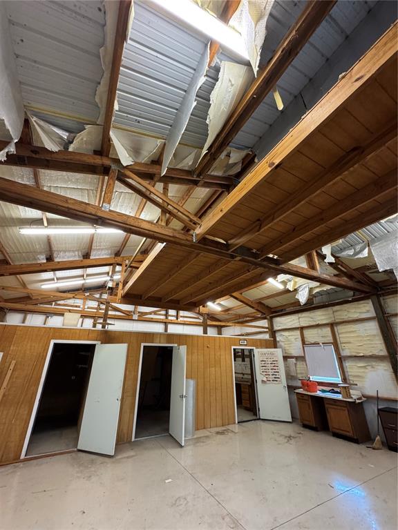 32443 Memory Lane Leesburg, FL 34788 - Photo 8 of 51 a view of room with wooden ceiling