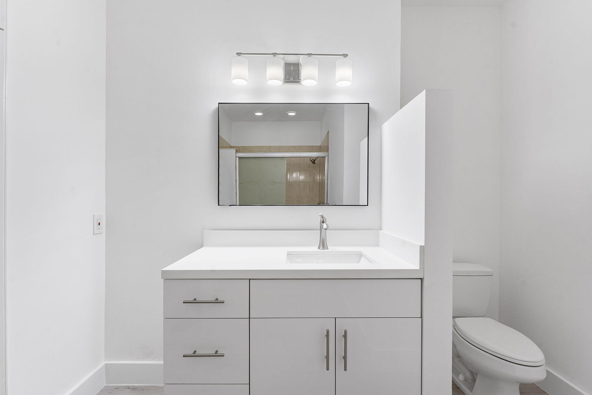 23157 Old Inlet Bridge Drive Boca Raton, FL 33433 - Photo 22 of 39 a bathroom with a toilet sink and mirror