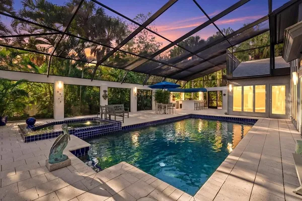 a view of swimming pool with a patio