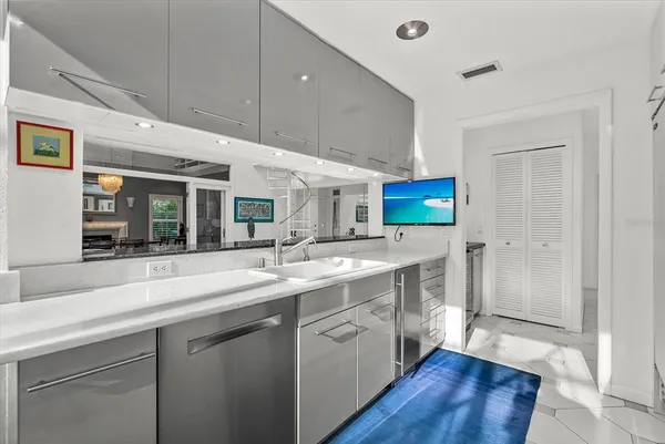 a view of living room with furniture and flat screen tv