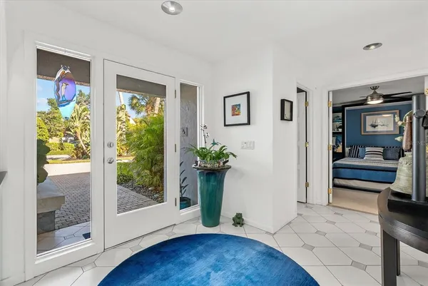a living room with furniture and view of living room