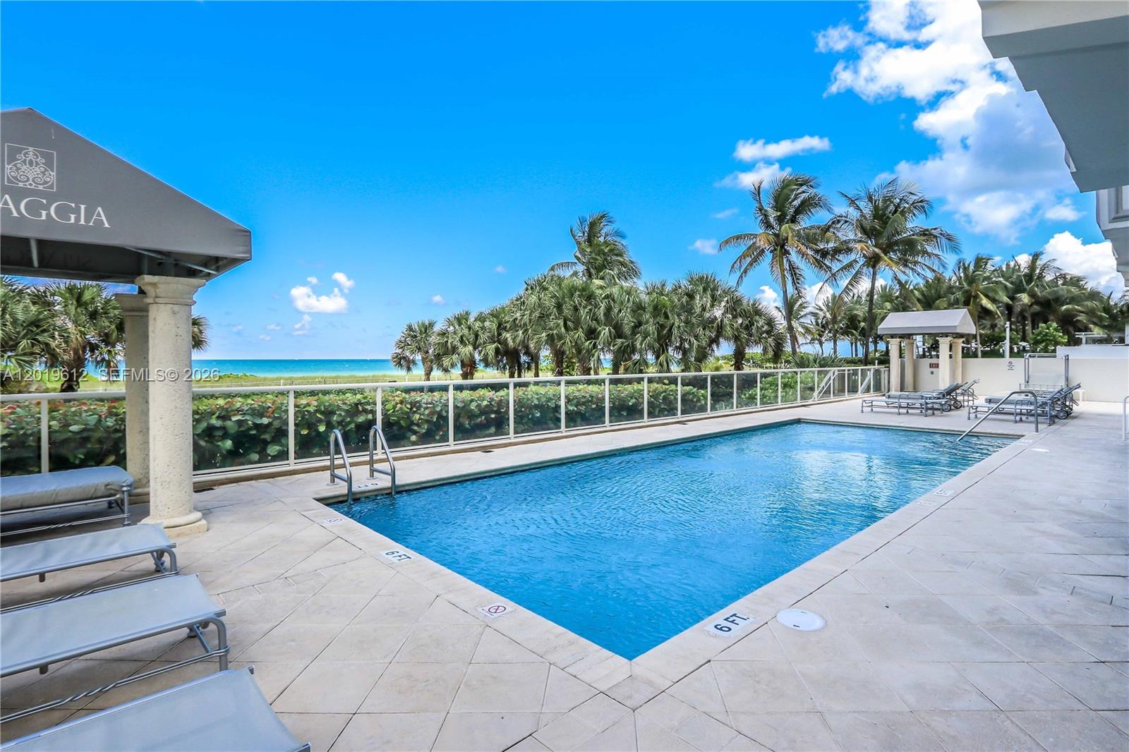 9499 Collins Avenue, Unit 705 Surfside, FL 33154 - Photo 15 of 29 a view of swimming pool with a patio