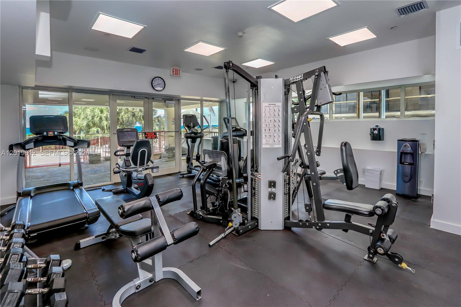 9499 Collins Avenue, Unit 705 Surfside, FL 33154 - Photo 16 of 29 a view of a room with gym equipment