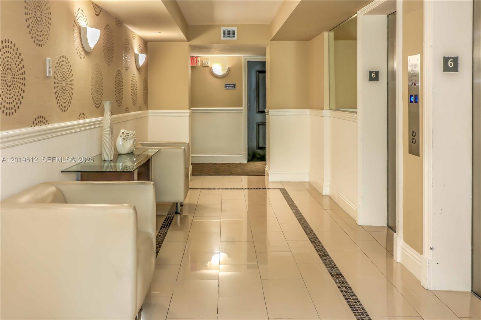 9499 Collins Avenue, Unit 705 Surfside, FL 33154 - Photo 17 of 29 a bathroom with a sink a toilet and shower