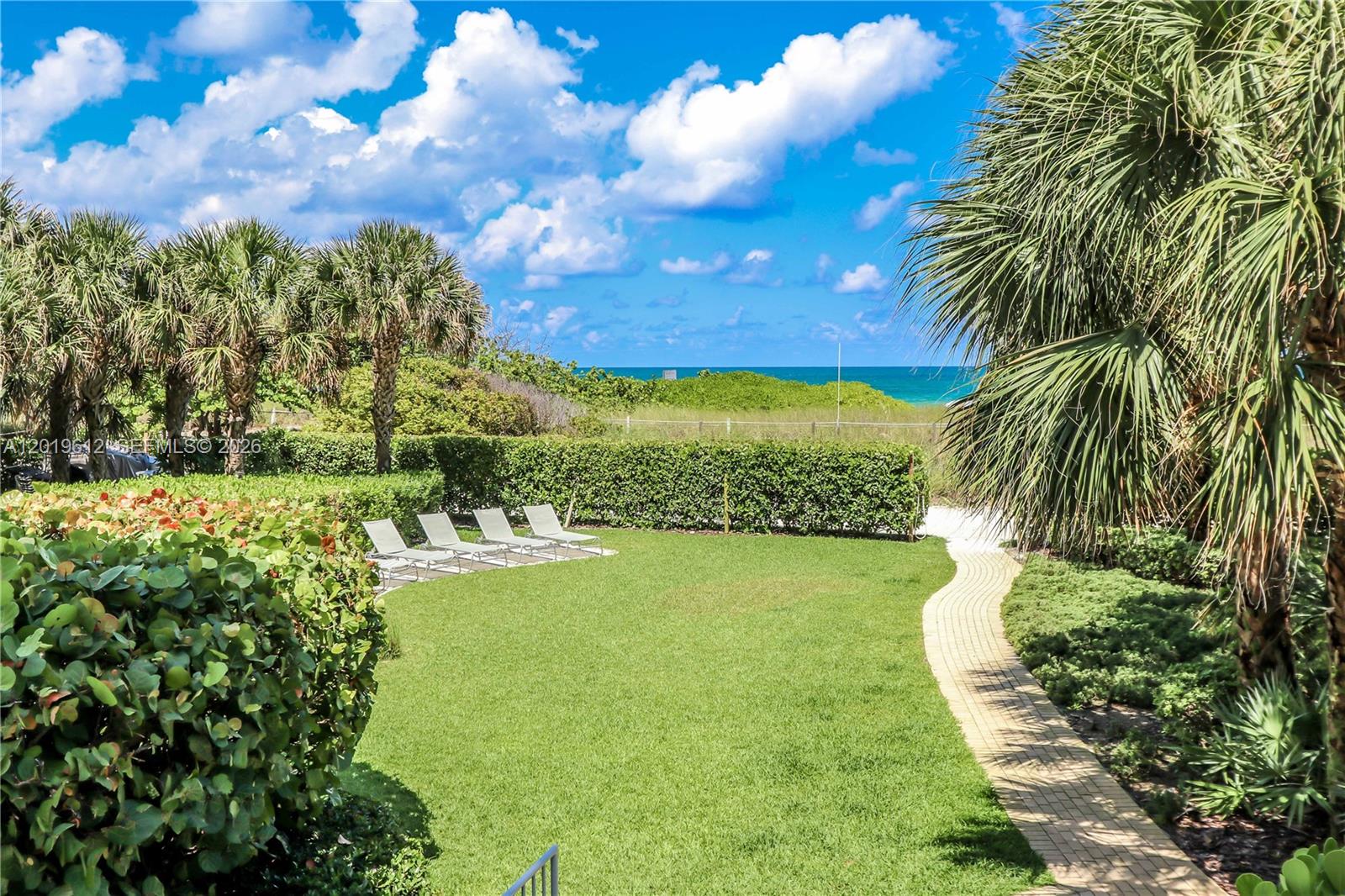 9499 Collins Avenue, Unit 705 Surfside, FL 33154 - Photo 20 of 29 a view of a garden