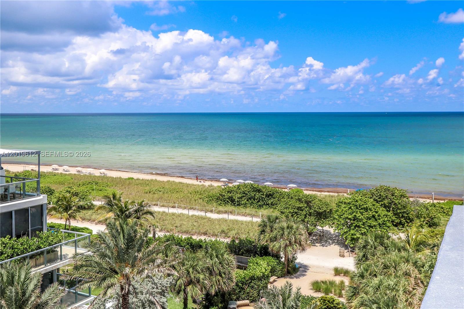 9499 Collins Avenue, Unit 705 Surfside, FL 33154 - Photo 21 of 29 a view of a lake from a yard