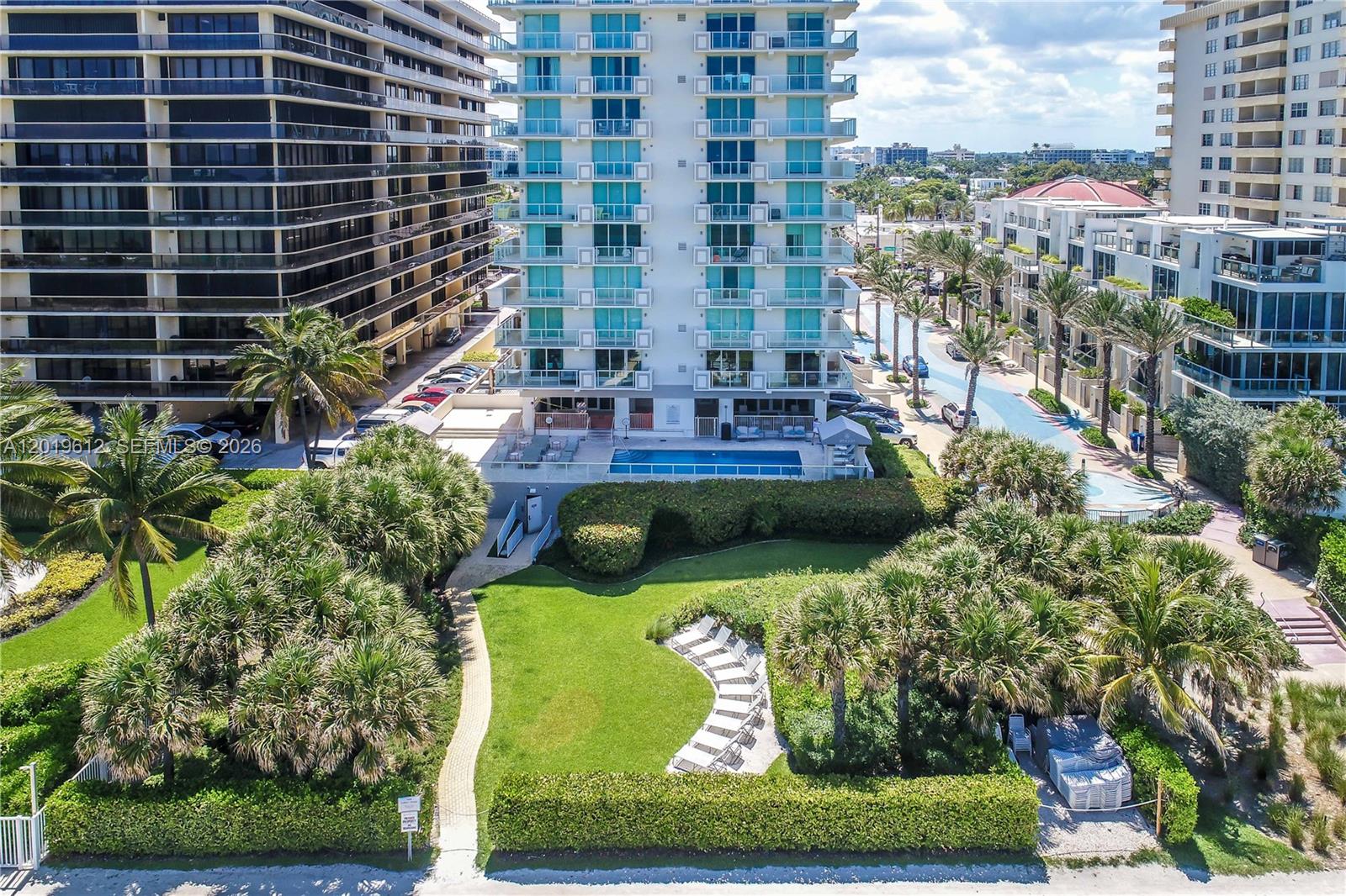 9499 Collins Avenue, Unit 705 Surfside, FL 33154 - Photo 25 of 29 a view of a city with tall buildings