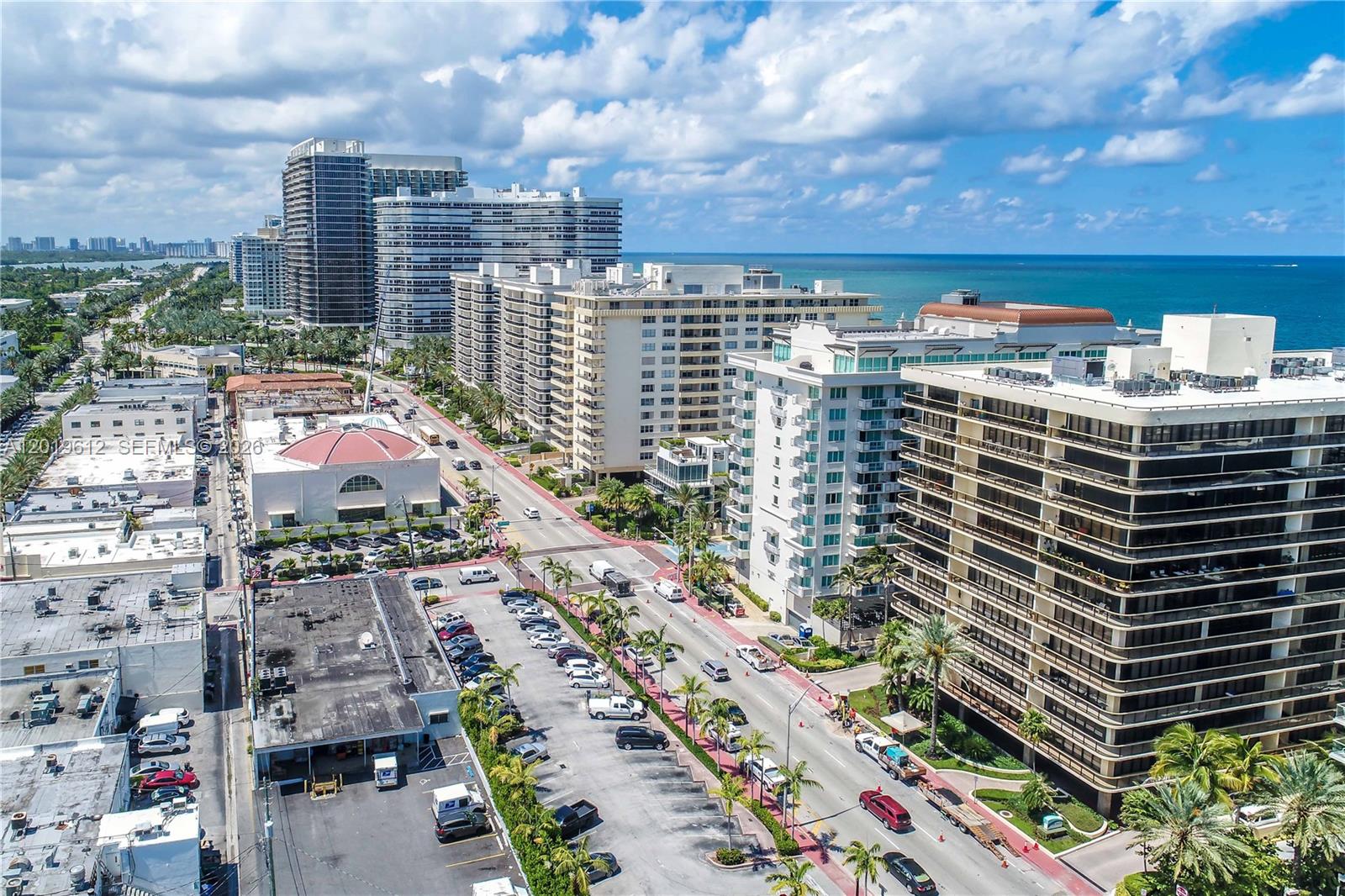 9499 Collins Avenue, Unit 705 Surfside, FL 33154 - Photo 27 of 29 a city view with tall buildings