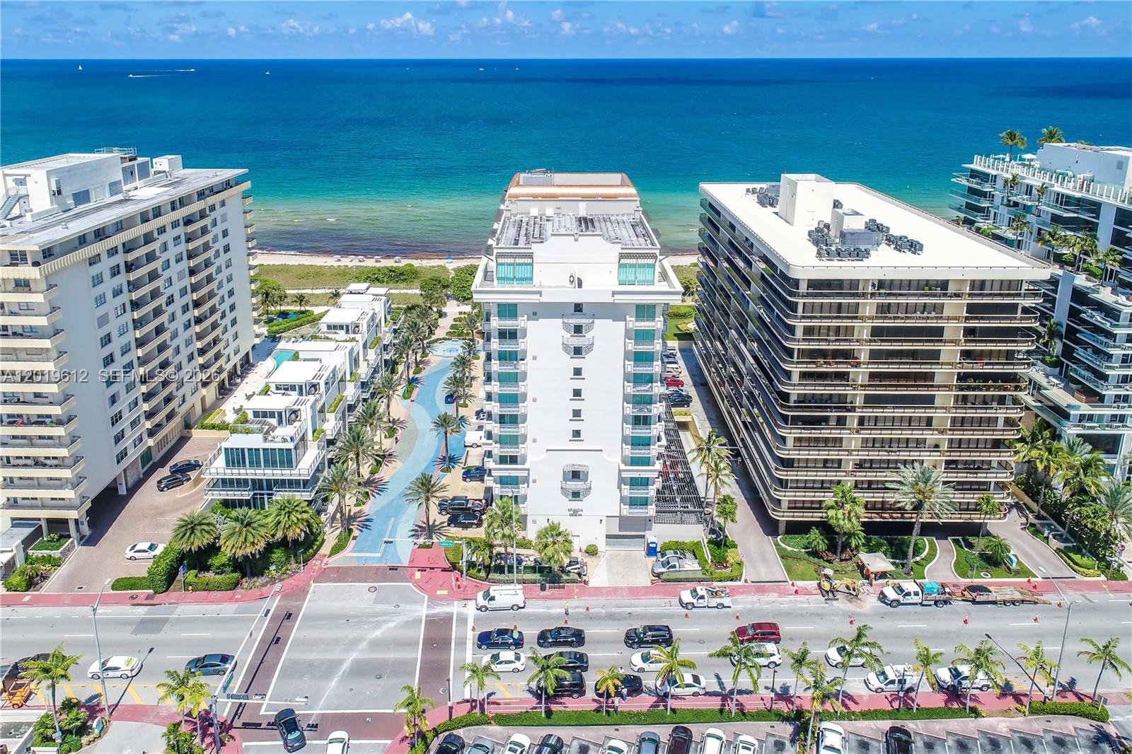 9499 Collins Avenue, Unit 705 Surfside, FL 33154 - Photo 29 of 29 a front view of a building with glass windows