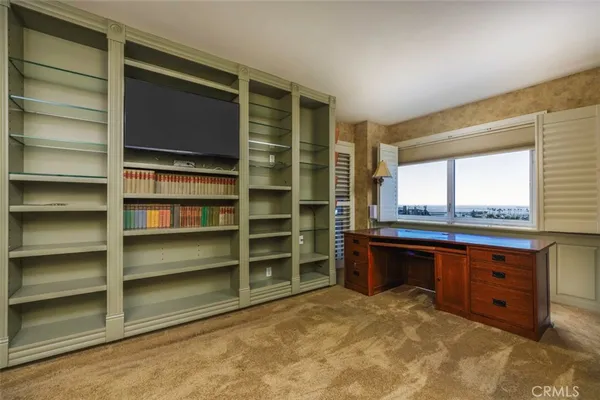 a room with furniture and a window