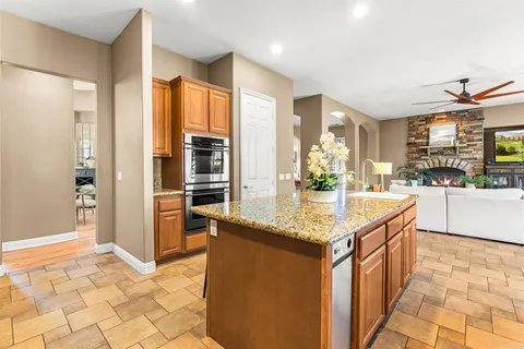 a living room with furniture or couches and a large window