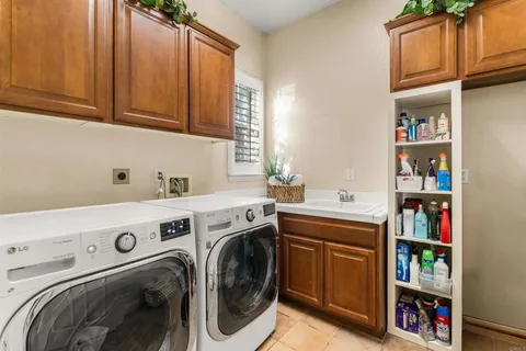 a bathroom with a bathtub and mirror
