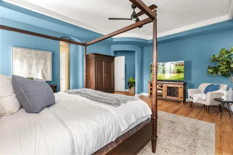 a view of a terrace with furniture and city view