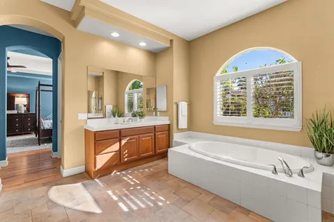 a view of a house with swimming pool and a yard