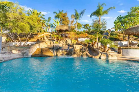 a view of a backyard with a patio