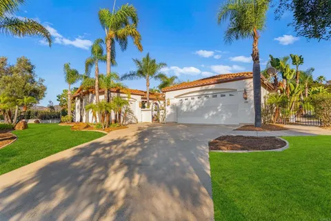 a front view of house with outdoor seating