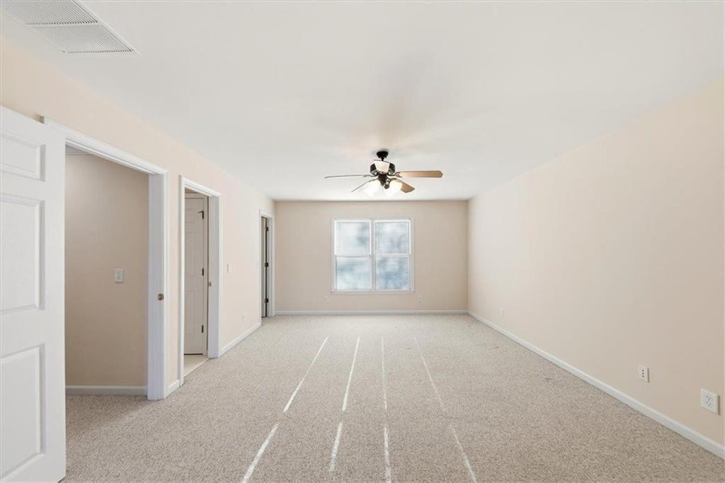 834 Valley Drive Canton, GA 30114 - Photo 24 of 49 a view of an empty room with a window