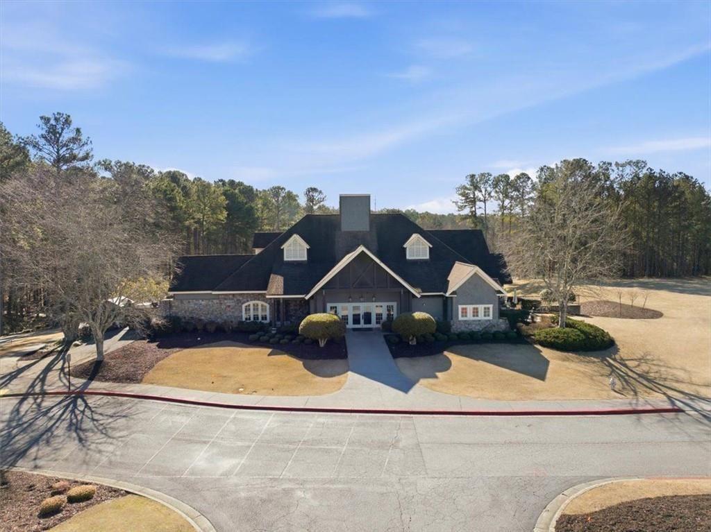 834 Valley Drive Canton, GA 30114 - Photo 44 of 49 a view of a house with a big yard couches and sky view
