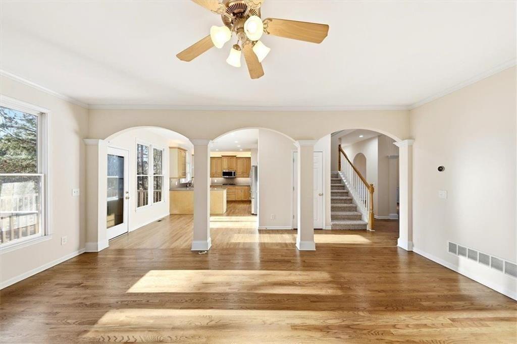 834 Valley Drive Canton, GA 30114 - Photo 10 of 49 a view of an room with wooden floor and windows