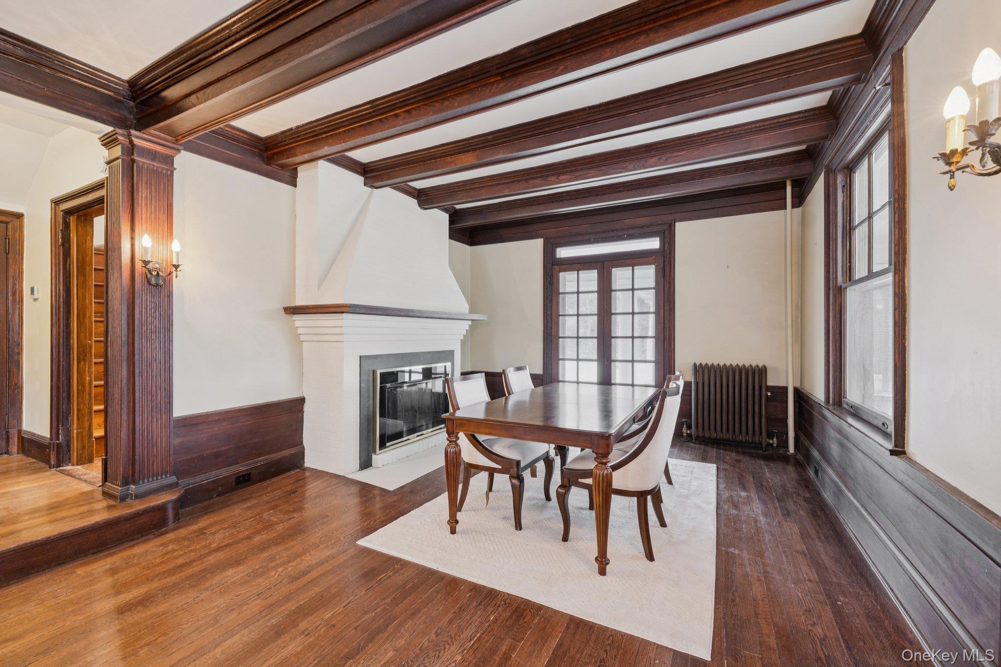397 Split Rock Road Syosset, NY 11791 - Photo 5 of 29 a dining room with furniture and wooden floor