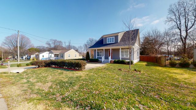 a view of a porch with a yard