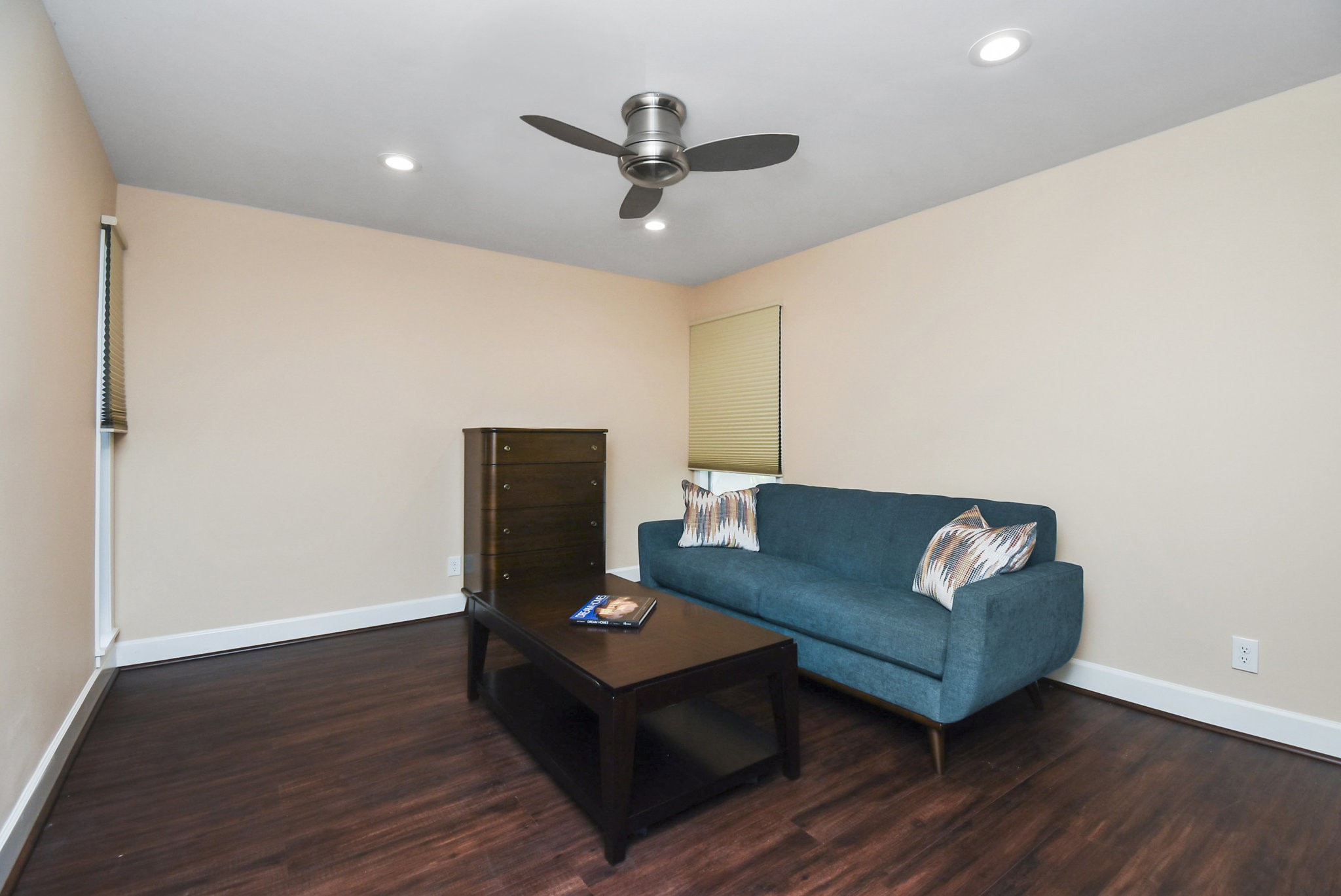 6401 Bayou Glen Road Houston, TX 77057 - Photo 18 of 22 a living room with furniture and a wooden floor