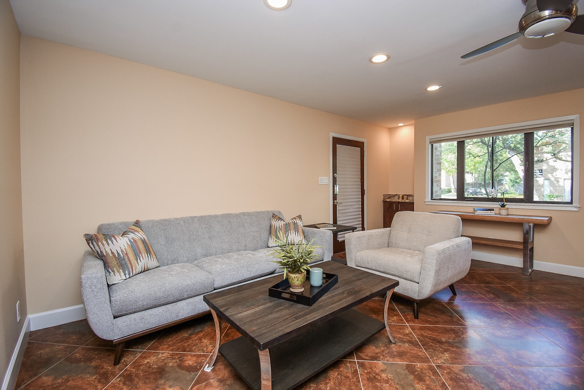 6401 Bayou Glen Road Houston, TX 77057 - Photo 7 of 22 a living room with furniture and a large window