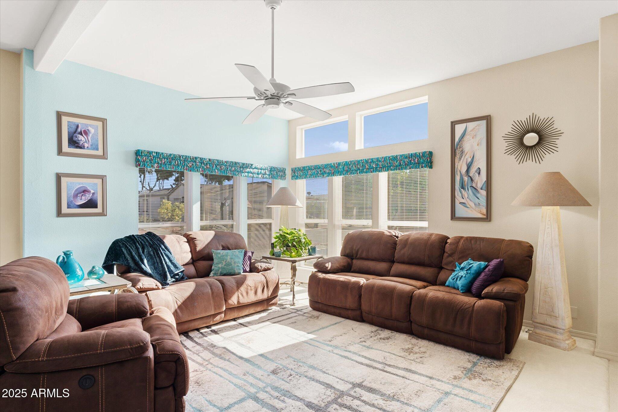 3700 South Tomahawk Road, Unit 26 & 27 Apache Junction, AZ 85119 - Photo 17 of 62 a living room with furniture ceiling fan and a window