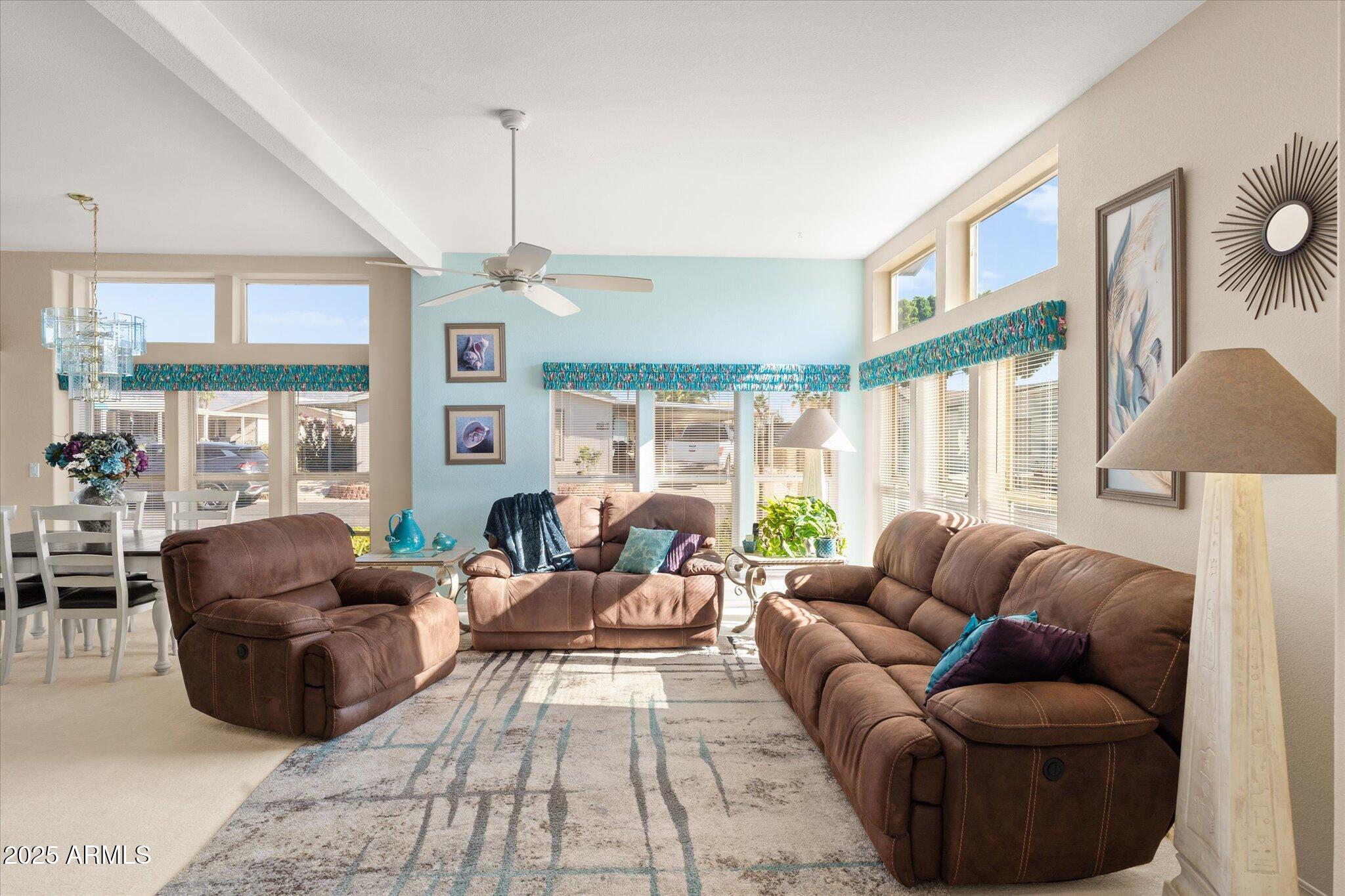 3700 South Tomahawk Road, Unit 26 & 27 Apache Junction, AZ 85119 - Photo 18 of 62 a living room with furniture and a large window