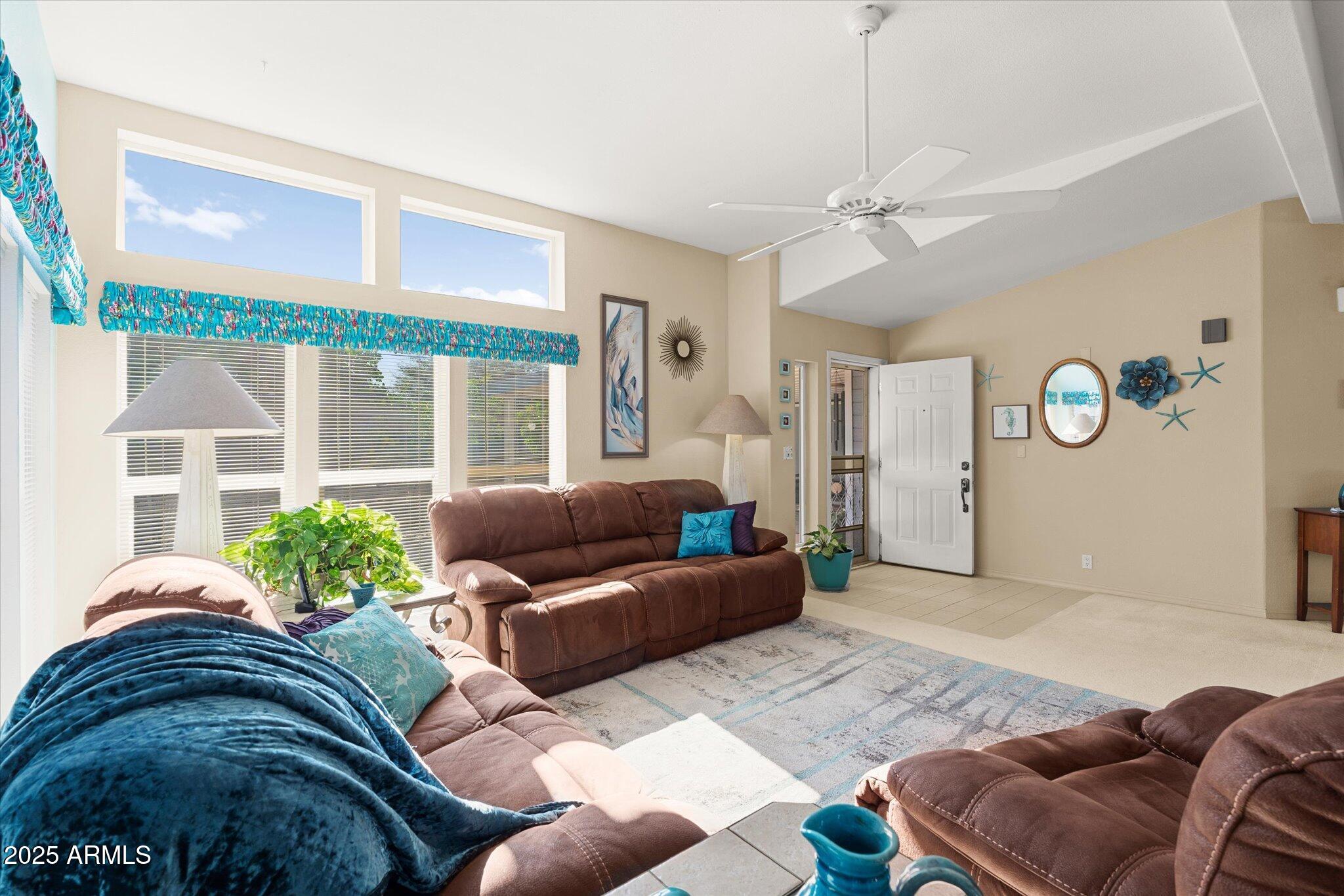 3700 South Tomahawk Road, Unit 26 & 27 Apache Junction, AZ 85119 - Photo 21 of 62 a living room with furniture and a large window