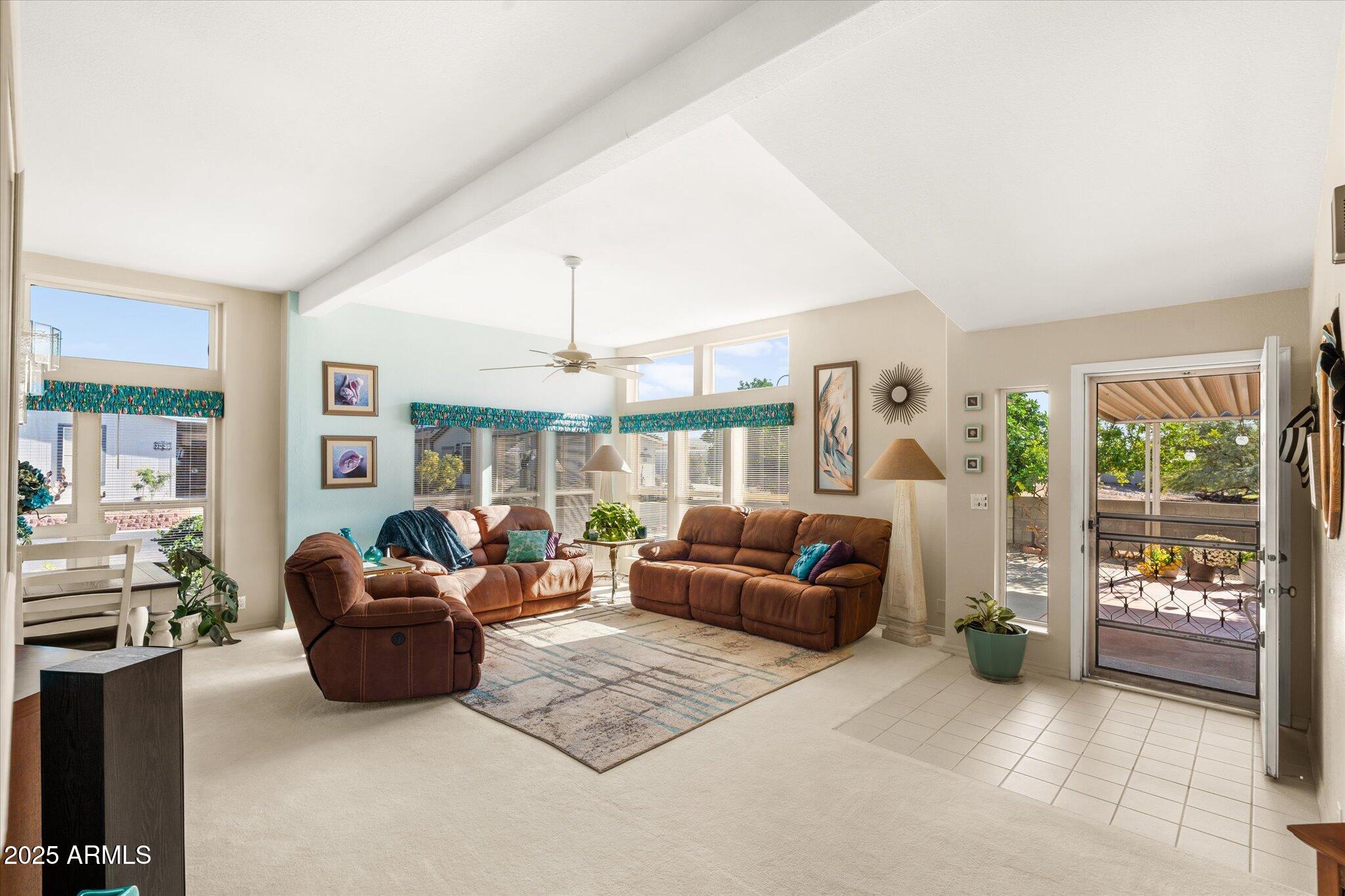 3700 South Tomahawk Road, Unit 26 & 27 Apache Junction, AZ 85119 - Photo 22 of 62 a living room with furniture and a large window