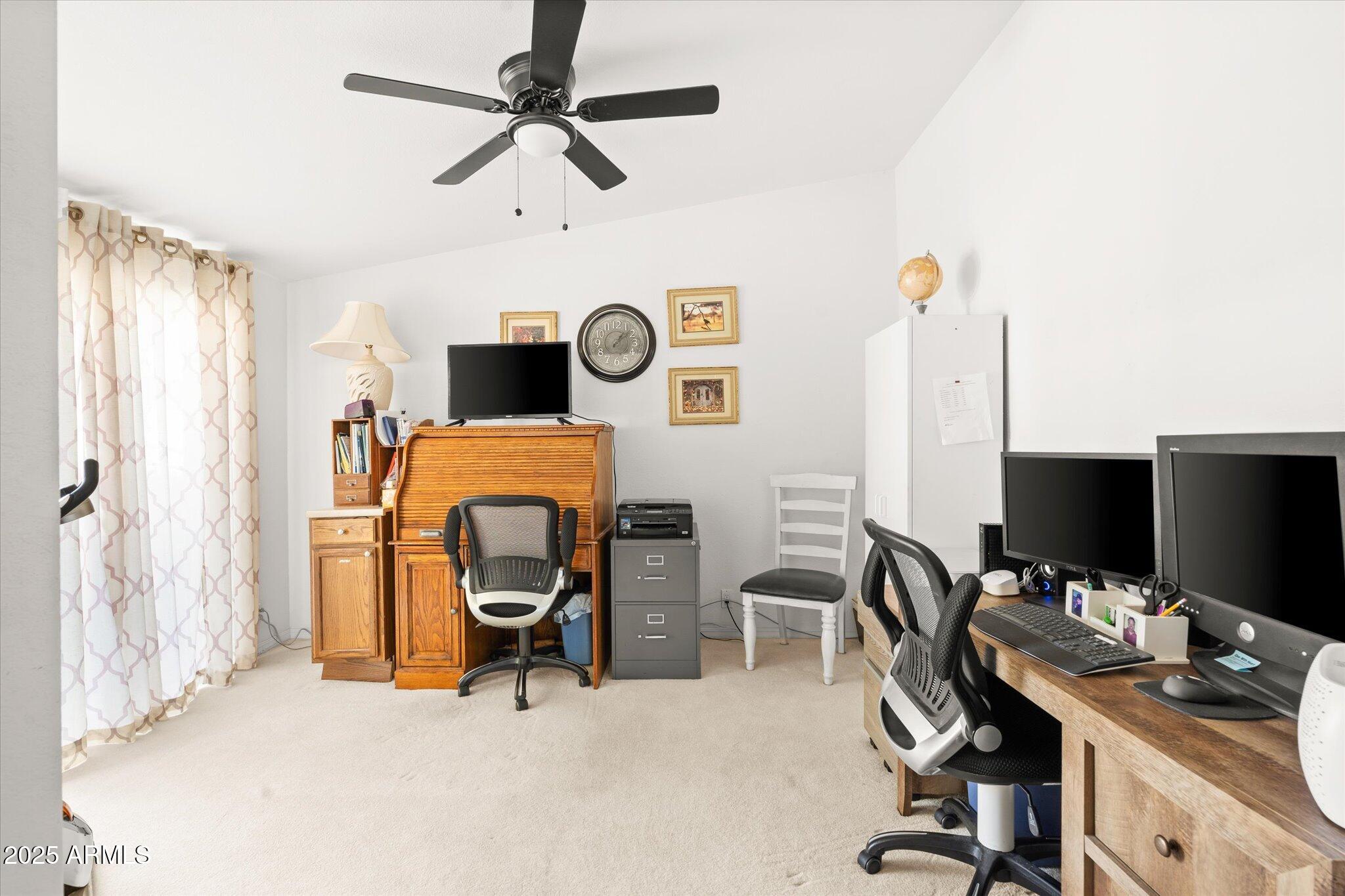 3700 South Tomahawk Road, Unit 26 & 27 Apache Junction, AZ 85119 - Photo 27 of 62 a view of a workspace with furniture and a window