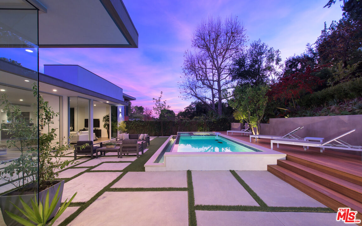2213 Roscomare Road Los Angeles, CA 90077 - Photo 23 of 46 a view of outdoor space patio and swimming pool