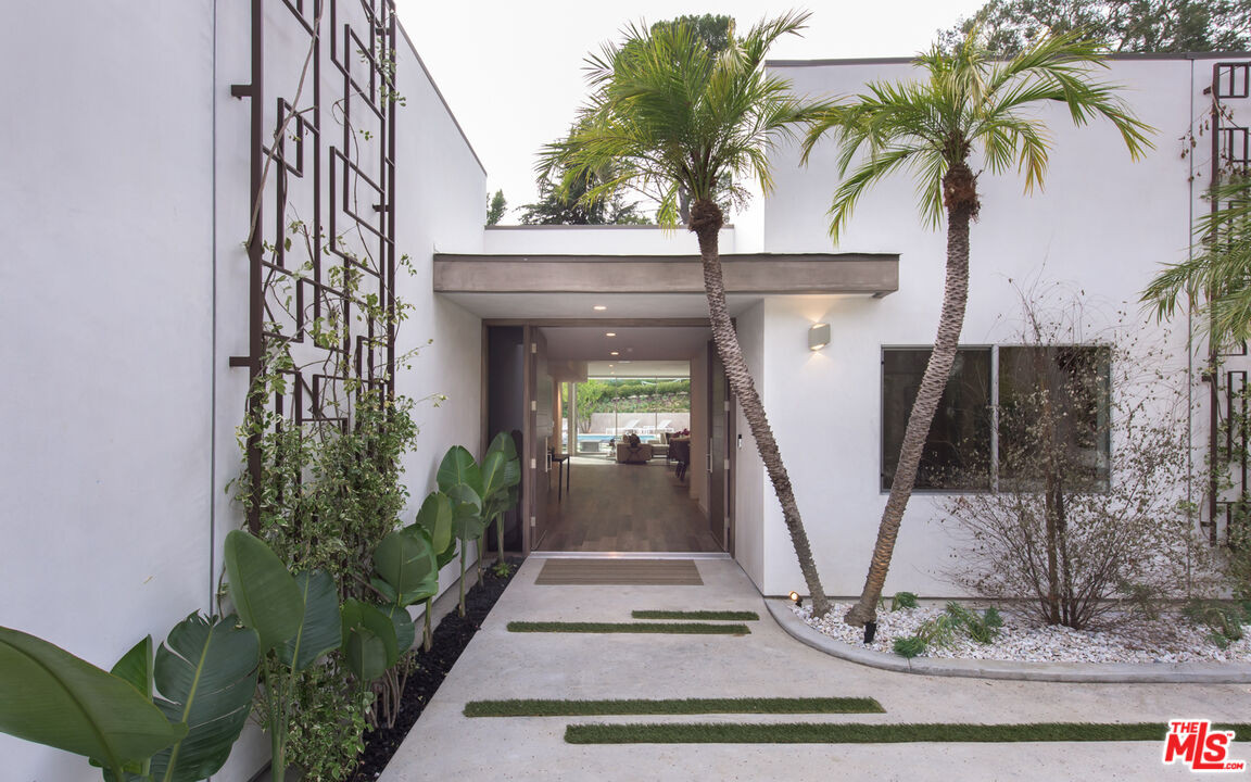 2213 Roscomare Road Los Angeles, CA 90077 - Photo 4 of 46 a view of a entryway door of house