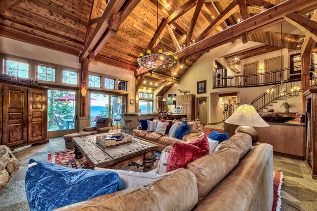 a kitchen with stainless steel appliances a sink stove and cabinets