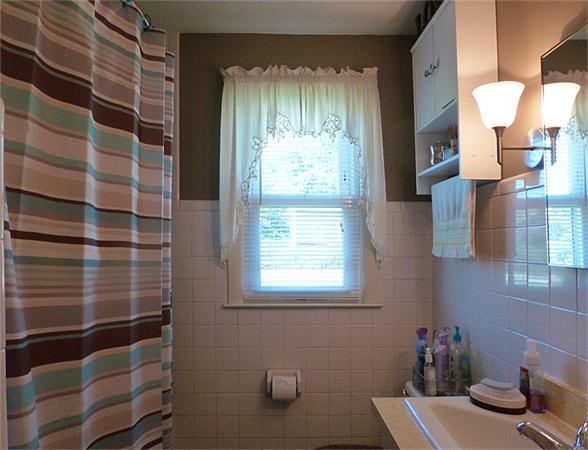 41 Bethany Road Monson, MA 01057 - Photo 11 of 24 a bathroom with a window and a shower