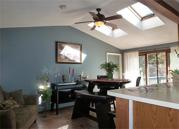 41 Bethany Road Monson, MA 01057 - Photo 3 of 24 a dining room with wooden floor and a chandelier