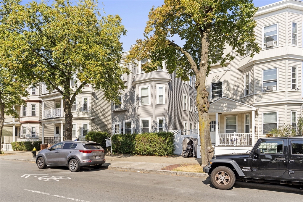742 Bennington Street, Unit 3 Boston, MA 02128 - Photo 15 of 16 a car parked in front of a house