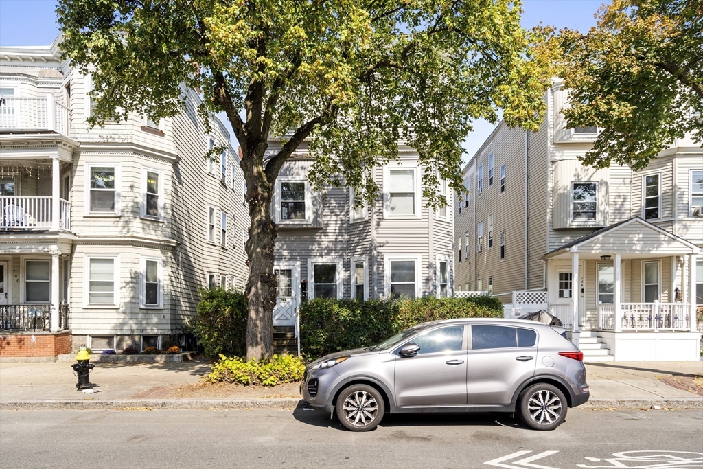 742 Bennington Street, Unit 3 Boston, MA 02128 - Photo 16 of 16 a car parked in front of a building