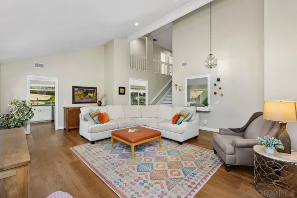 a living room with furniture and a couch