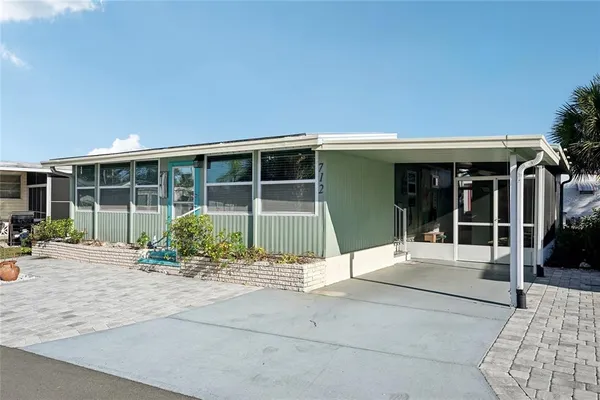 a house view with a outdoor space