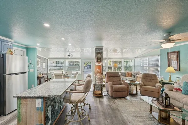 a living room with furniture and a table