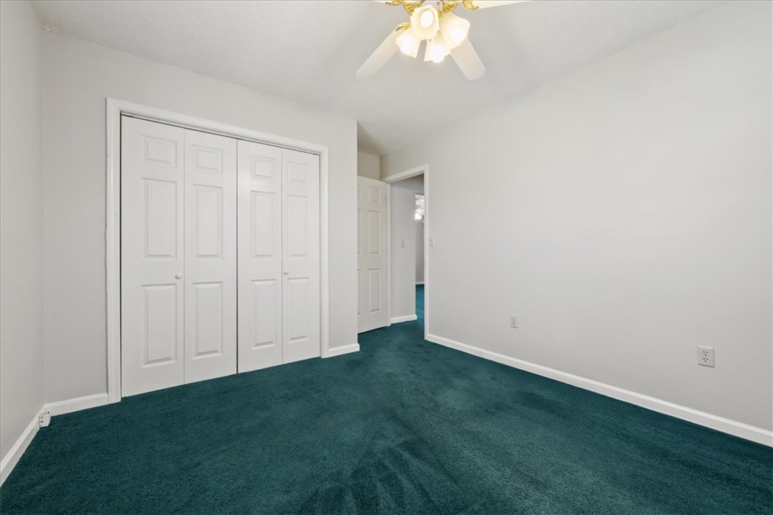 412 Carver Street Anderson, SC 29624 - Photo 14 of 23 This cozy bedroom features plush carpeting, offering a comfortable and inviting retreat.