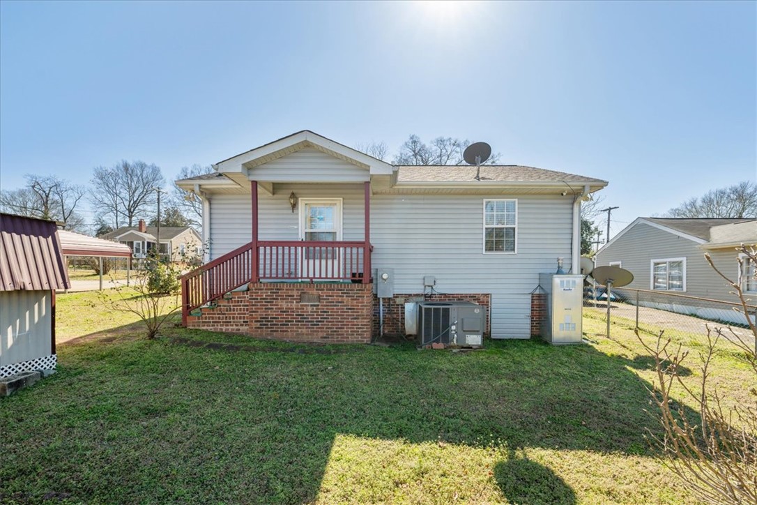 412 Carver Street Anderson, SC 29624 - Photo 23 of 23 This charming home offers a welcoming porch, a verdant lawn, and a cozy outdoor space.