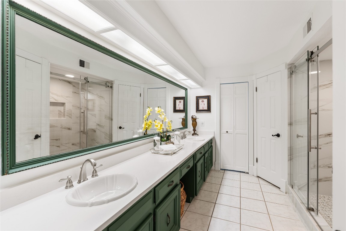 16011 Stratton Park Drive Spring, TX 77379 - Photo 21 of 47 a bathroom with a granite countertop sink double vanity and a mirror