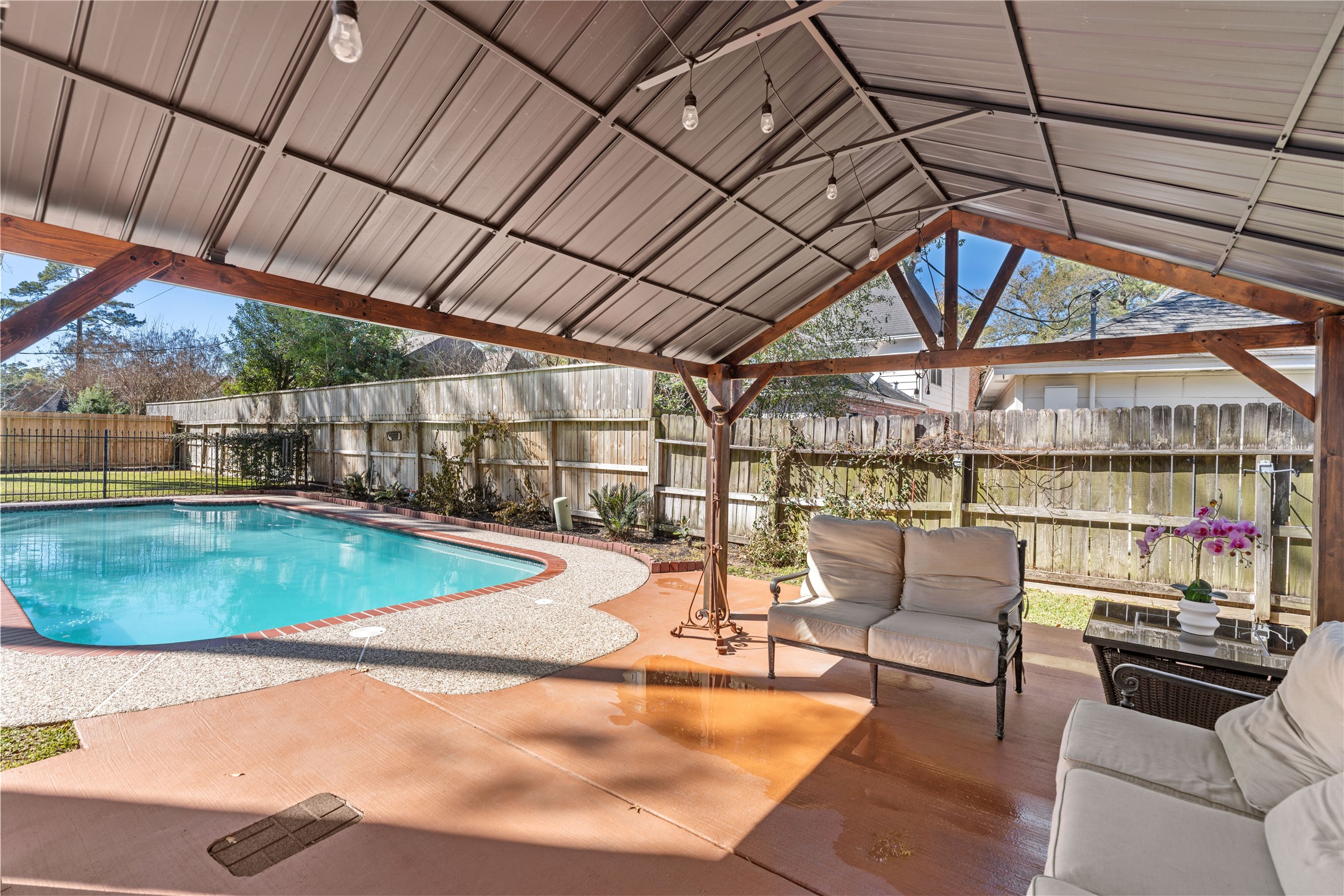 16011 Stratton Park Drive Spring, TX 77379 - Photo 38 of 47 a view of a swimming pool with a patio