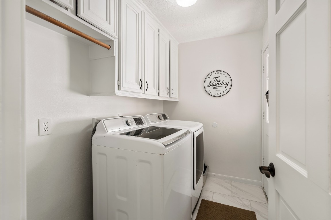 16011 Stratton Park Drive Spring, TX 77379 - Photo 45 of 47 a view of storage and utility room with washer and dryer