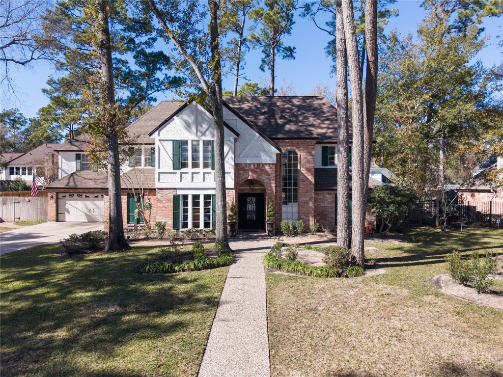 16011 Stratton Park Drive Spring, TX 77379 - Photo 46 of 47 a front view of a house with a yard