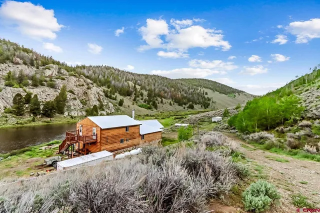 a view of a lake with a mountain